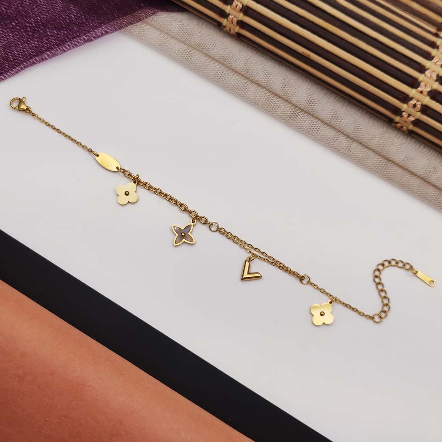 Minimal Gold Charm Bracelet with Floral & Heart Design